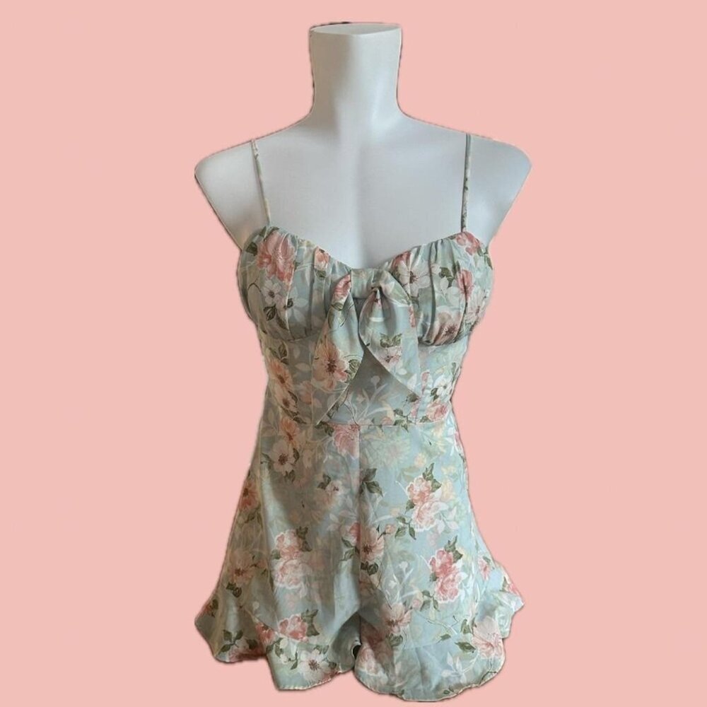 Beautiful pastel floral romper by Privy Privately Privileged